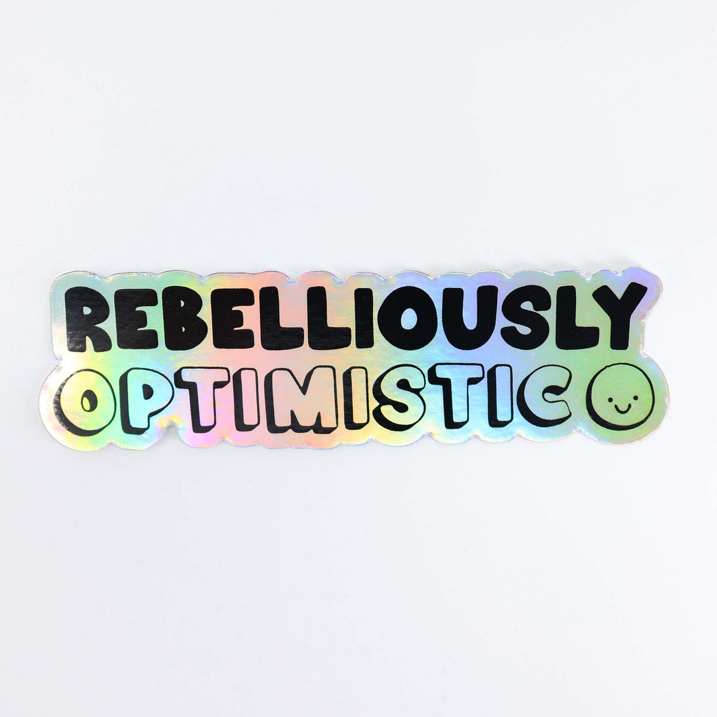 "Rebelliously Optimistic" — Holographic Sticker